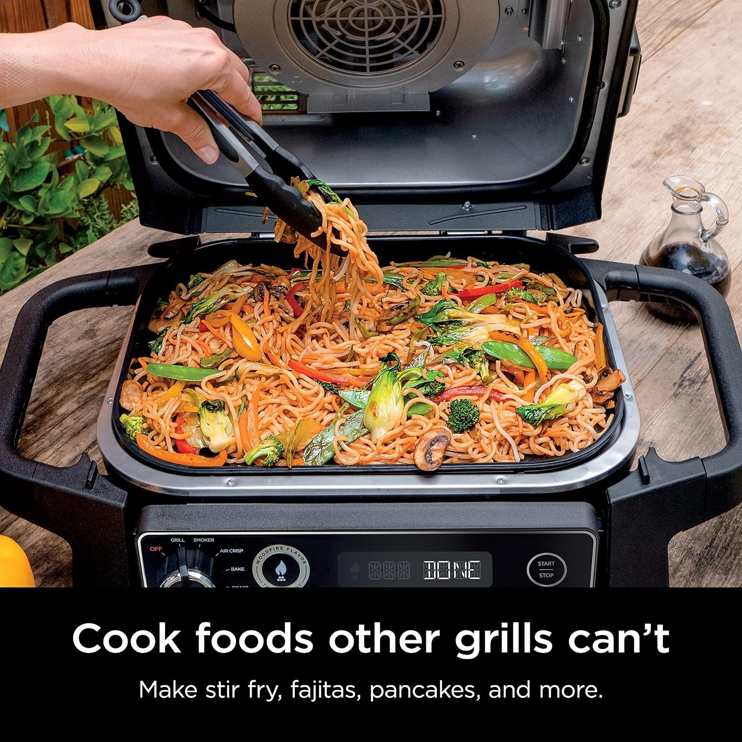 image:imageNinja XSKGRDPLT Woodfire Outdoor Flat Top Griddle Plate Compatible with Ninja Woodfire Grills OG700 series Ceramic Coating Insert BlackGrey Ninja Woodfire Griddle Plate clicks into your grill for even edgetoedge searing and easyclean nonstick cooking146 x 11 x 22