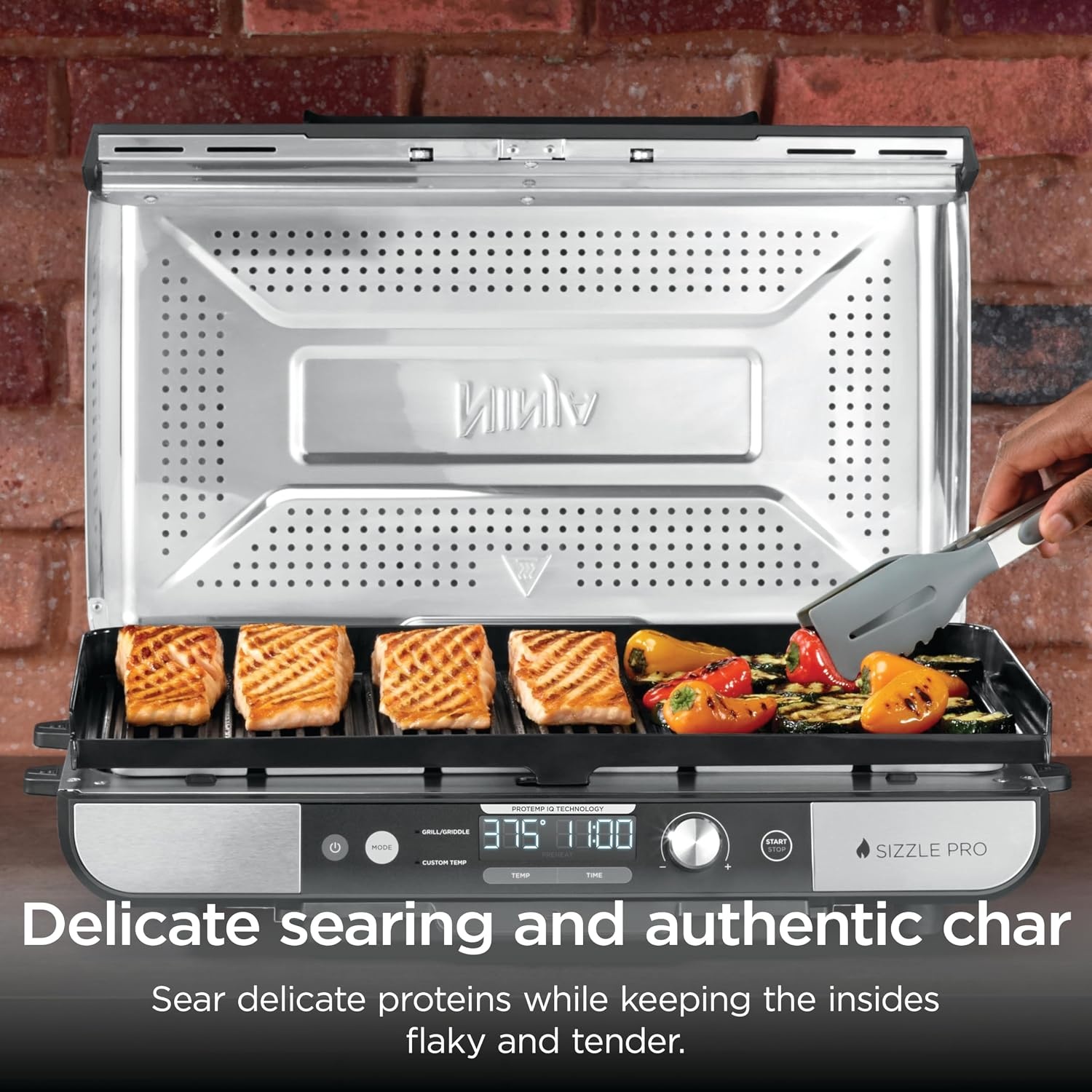 image:imageNinja Sizzle Indoor Grill amp Griddle 14 500F GreySilver GR101 Interchangeable nonstick grill amp griddle plate dishwashersafe lid 500F edgetoedge heat for perfect chargrilled marks20 Inch