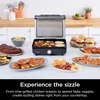 Ninja GR100 Sizzle Smokeless Indoor Grill with Nonstick Grill Plate, Dishwasher-Safe Removable Mesh Lid, 500F Max Heat, Even Edge-to-Edge Cooking, Black (Renewed)(Sizzle Indoor Grill & Griddle)