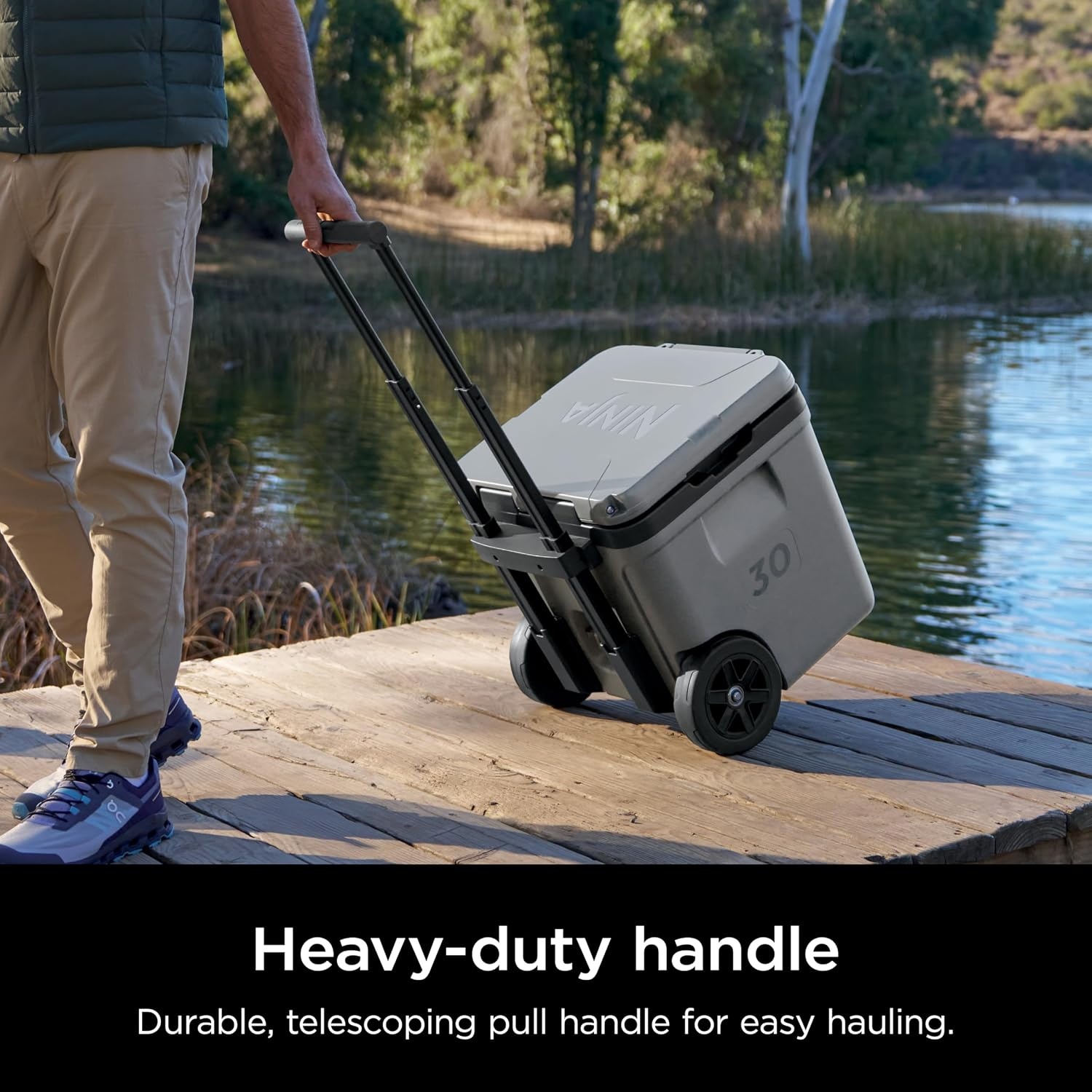 image:imageNinja FrostVault 30qt Cooler with Wheels Dry Storage Lakeshore Blue Ninja FrostVaults 30qt capacity holds 48 cans keeps food cool amp dry and rolls easily on allterrain wheelsCharcoal Grey