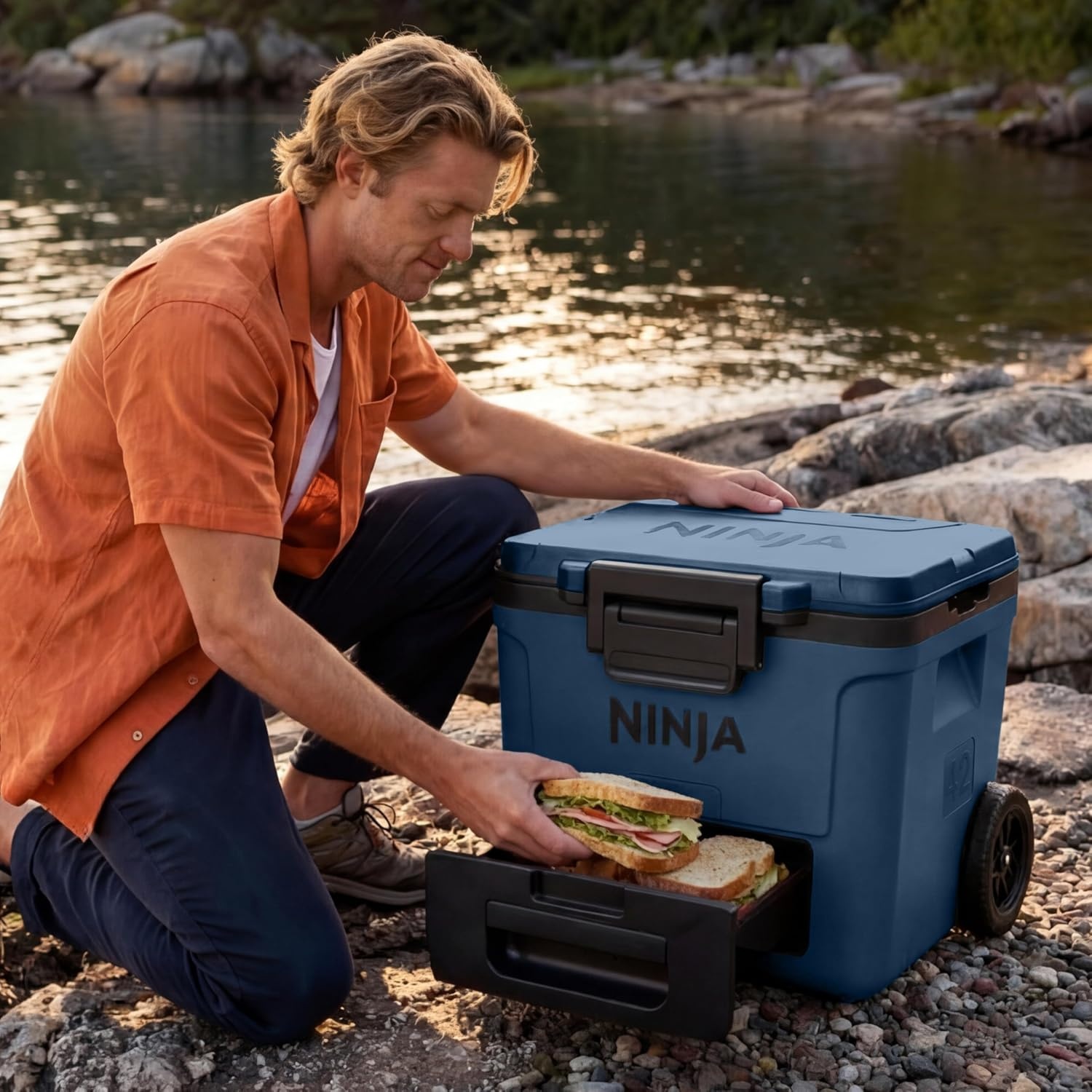 image:imageNinja FrostVault 30qt Cooler with Wheels Dry Storage Lakeshore Blue Ninja FrostVaults 30qt capacity holds 48 cans keeps food cool amp dry and rolls easily on allterrain wheelsMourning Dove
