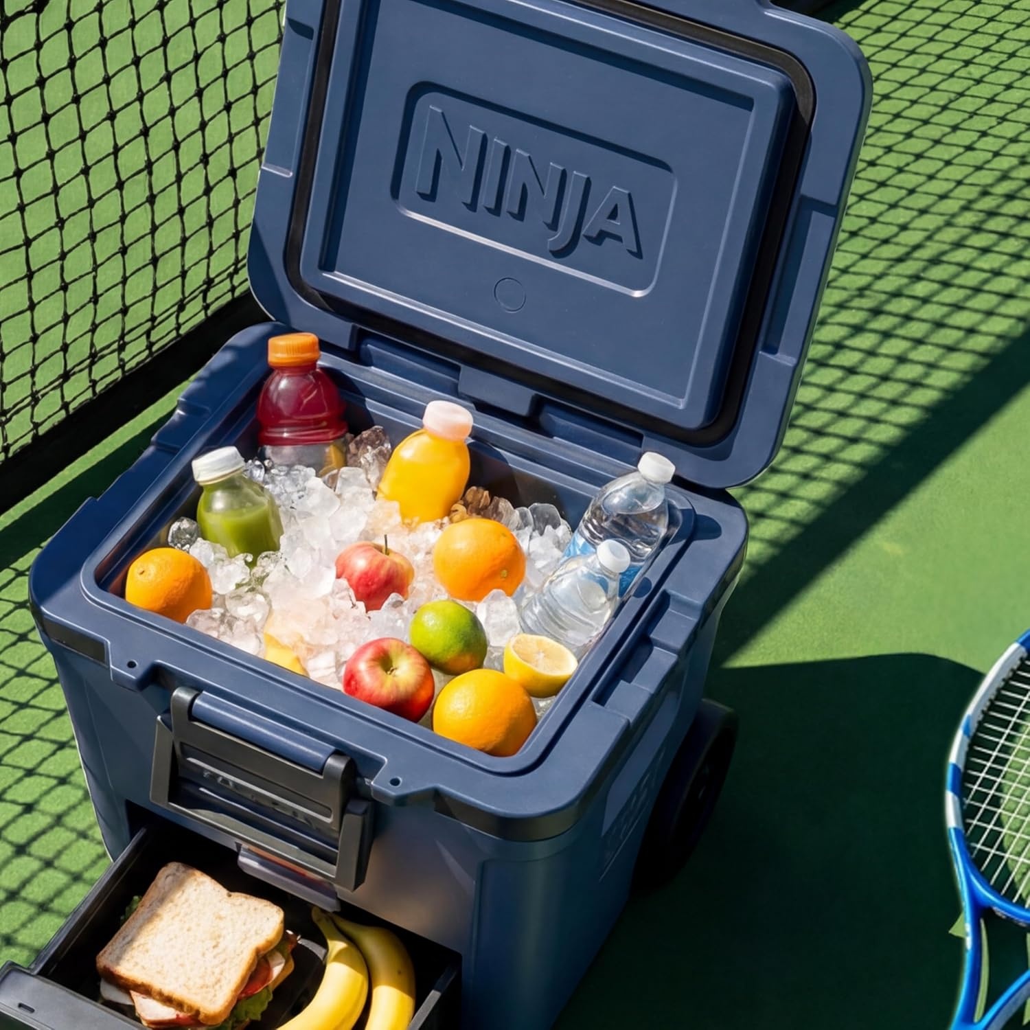 image:imageNinja FrostVault 30qt Cooler with Wheels Dry Storage Lakeshore Blue Ninja FrostVaults 30qt capacity holds 48 cans keeps food cool amp dry and rolls easily on allterrain wheelsCharcoal Grey