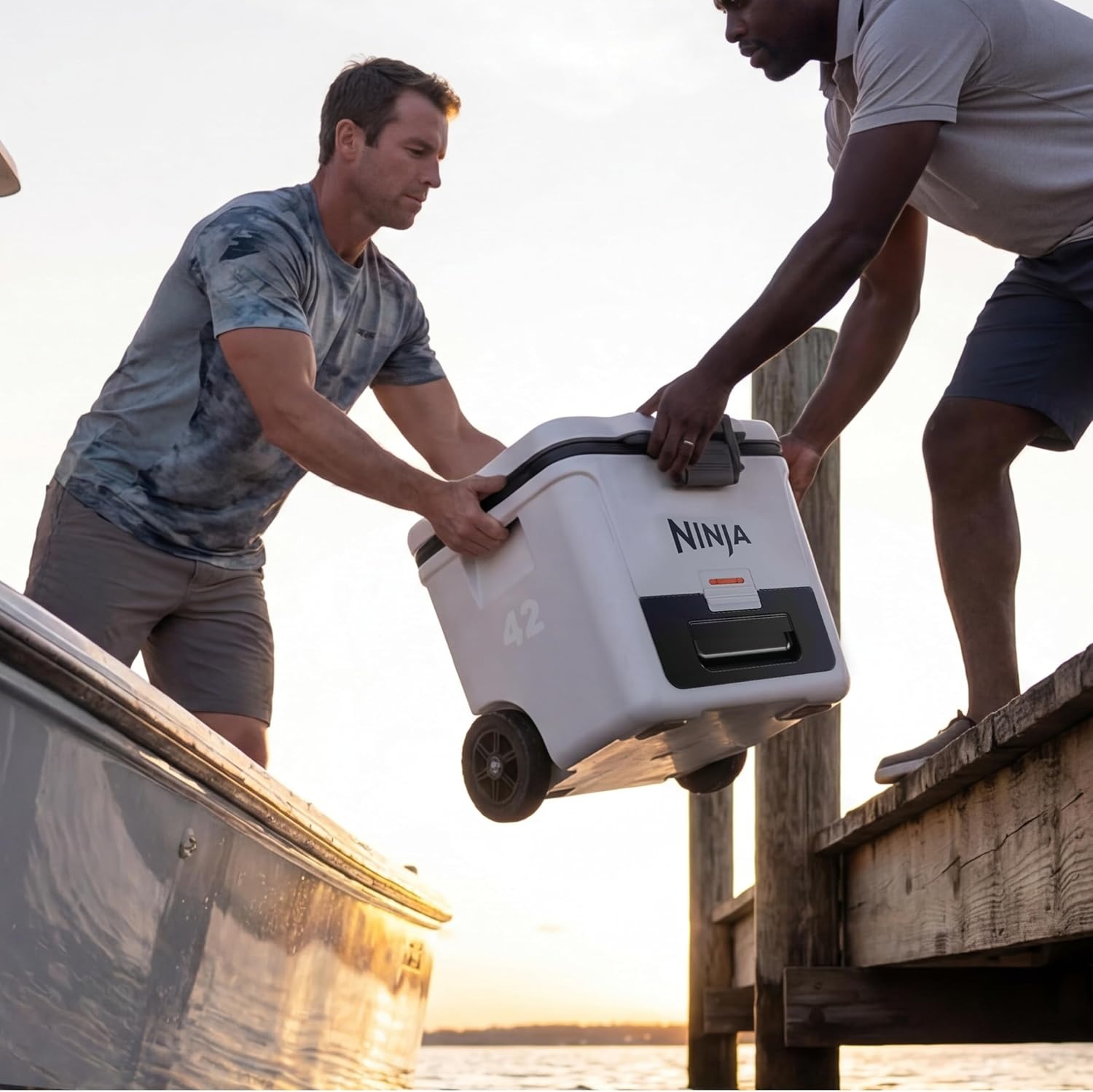 image:imageNinja FrostVault 30qt Cooler with Wheels Dry Storage Lakeshore Blue Ninja FrostVaults 30qt capacity holds 48 cans keeps food cool amp dry and rolls easily on allterrain wheelsCharcoal Grey