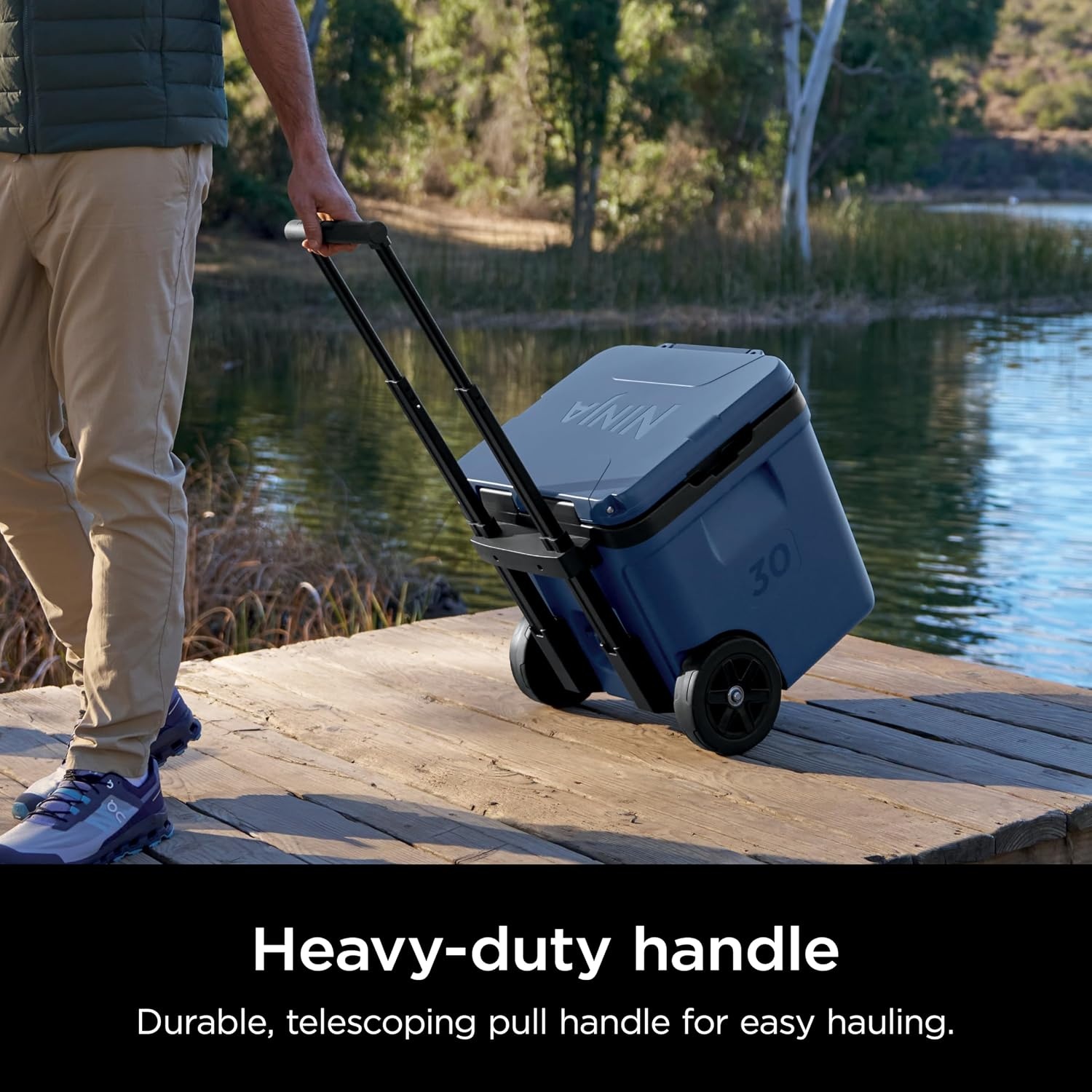 image:imageNinja FrostVault 30qt Cooler with Wheels Dry Storage Lakeshore Blue Ninja FrostVaults 30qt capacity holds 48 cans keeps food cool amp dry and rolls easily on allterrain wheelsLakeshore Blue