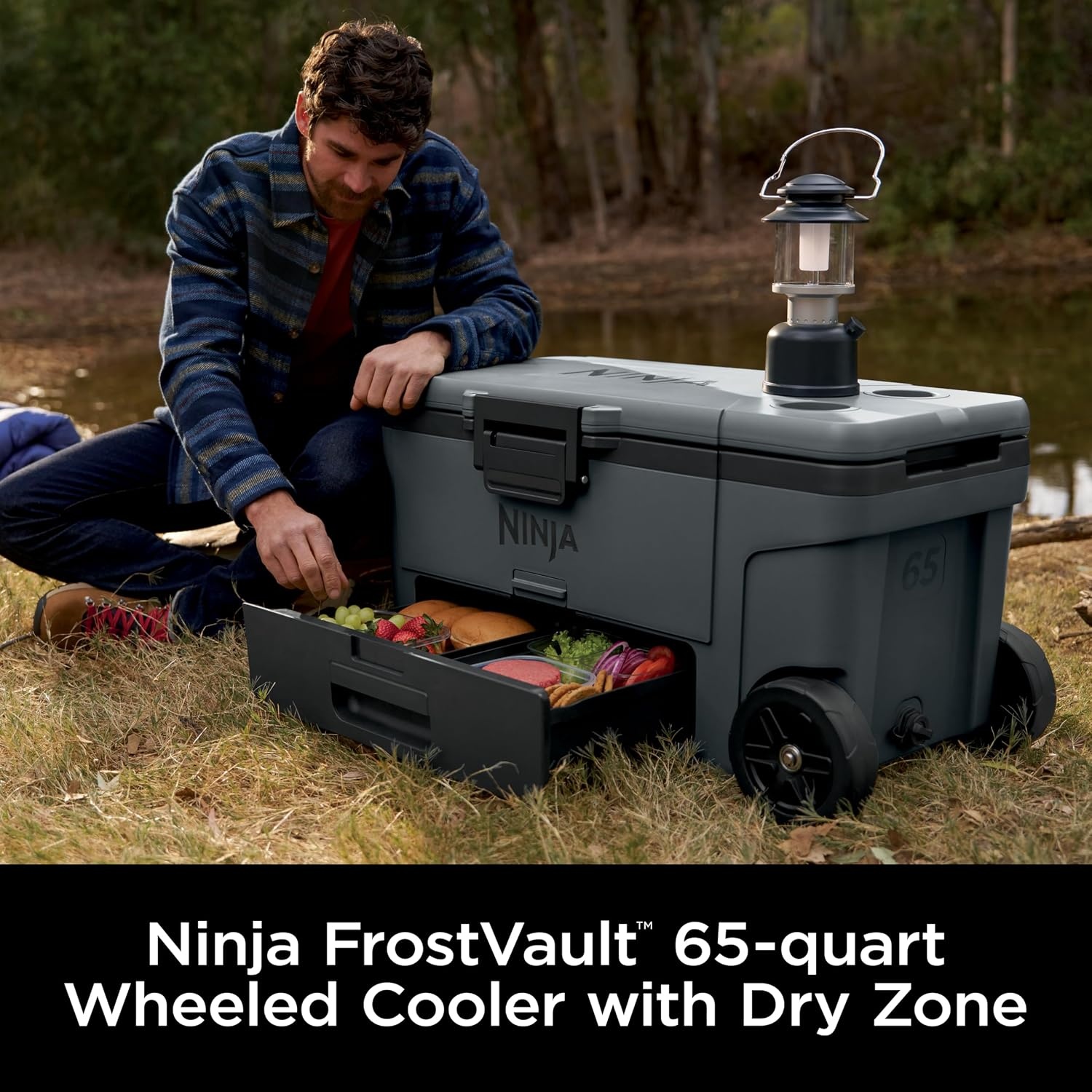 image:imageNinja FrostVault 45qt Cooler with Wheels Dry Storage Charcoal Gray Ninja FrostVaults 45qt capacity holds 68 cans keeps food cool amp dry and rolls easily on allterrain wheelsCharcoal Grey