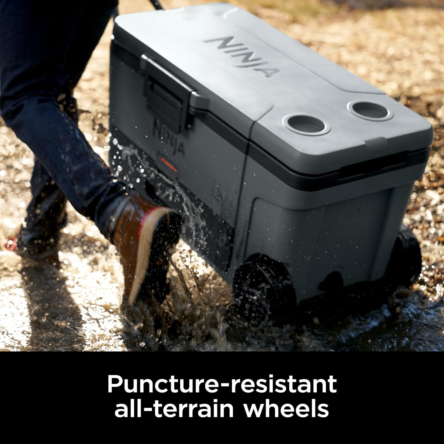 image:imageNinja FrostVault 45qt Cooler with Wheels Dry Storage Charcoal Gray Ninja FrostVaults 45qt capacity holds 68 cans keeps food cool amp dry and rolls easily on allterrain wheelsCharcoal Grey