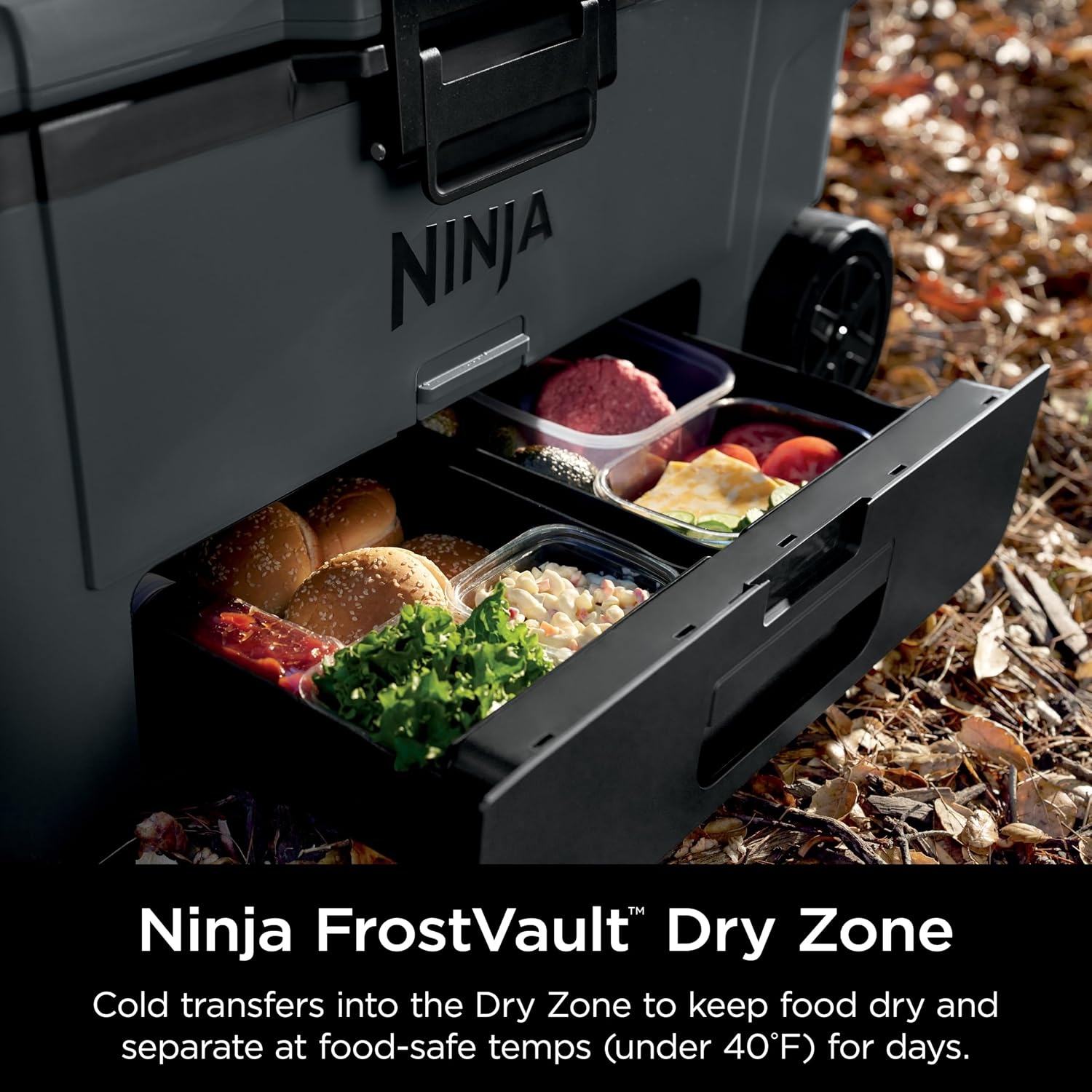 image:imageNinja FrostVault 45qt Cooler with Wheels Dry Storage Charcoal Gray Ninja FrostVaults 45qt capacity holds 68 cans keeps food cool amp dry and rolls easily on allterrain wheelsCharcoal Grey