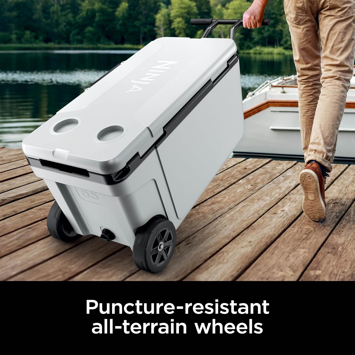 image:imageNinja FrostVault 45qt Cooler with Wheels Dry Storage Charcoal Gray Ninja FrostVaults 45qt capacity holds 68 cans keeps food cool amp dry and rolls easily on allterrain wheelsCloud White