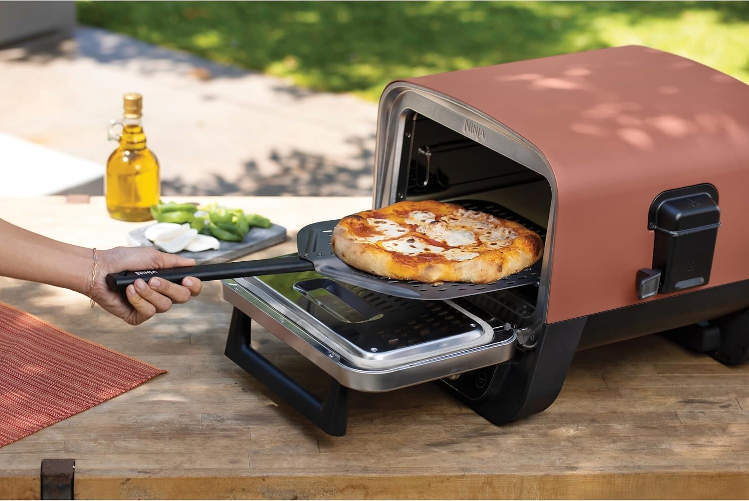 image:imageNinja Woodfire OO101UK Pizza Peel for Outdoor Oven Lightweight Perforated RustResistant for 30cm Pizzas Black BBQ or Grill XSKOOVPZPLEUK